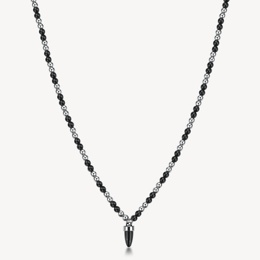 Collana in acciaio 316L, con sfere e pendente a forma di cornetto in onice nero.