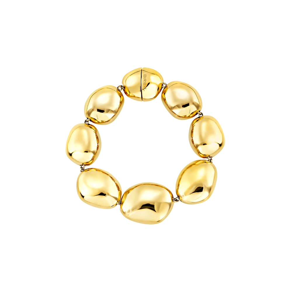 Bracciale chunky Petra da donna in acciaio Breil inossidabile con finitura PVD oro 14K, composto da 7 elementi dalle forme organiche ispirate alle pietre levigate dall'acqua.