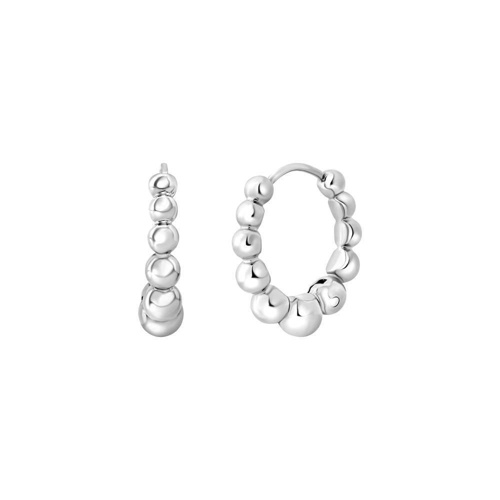 Orecchini a cerchio B Rocks da donna in acciaio Breil inossidabile lucido, con microsfere ispirate all'iconico sassolino Breil e piccoli dettagli sferici che valorizzano il design essenziale della collezione.