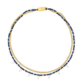 Collana Dunes and Stars da donna della collezione Magnetica System in acciaio Breil inossidabile con finitura PVD oro 14K, composta da una catena a microsfere e da un filo di cristalli blu impreziosito da 7 perle coltivate d'acqua dolce.