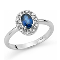 Anello Miluna in oro bianco 18 kt con zaffiro blu naturale taglio ovale e contorno di diamanti naturali.